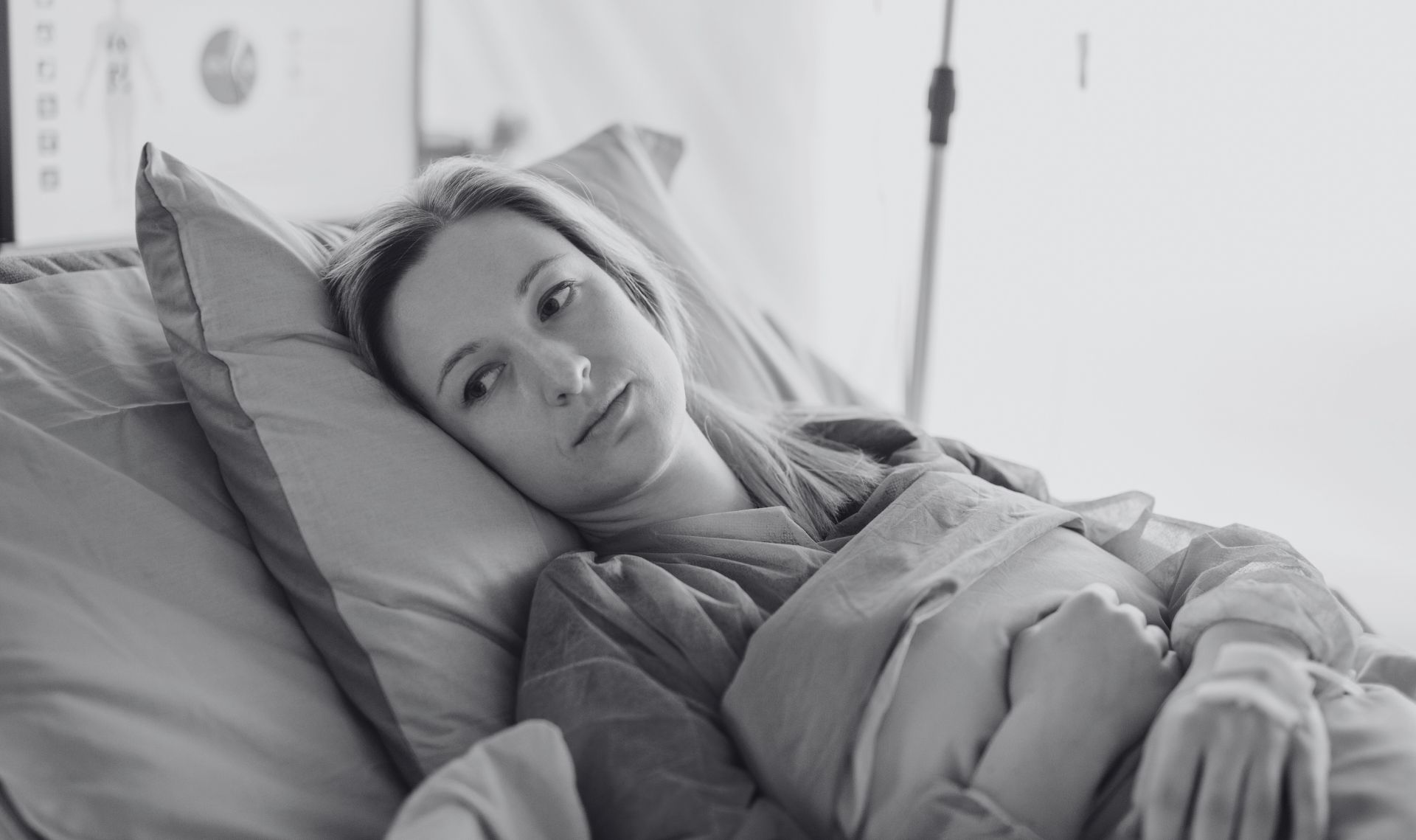Woman laying in bed